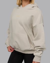 Woman wearing MVP Oversized Hoodie - Shale Beige | Model:Halle | Size:XS | Thumbnail Index: 2