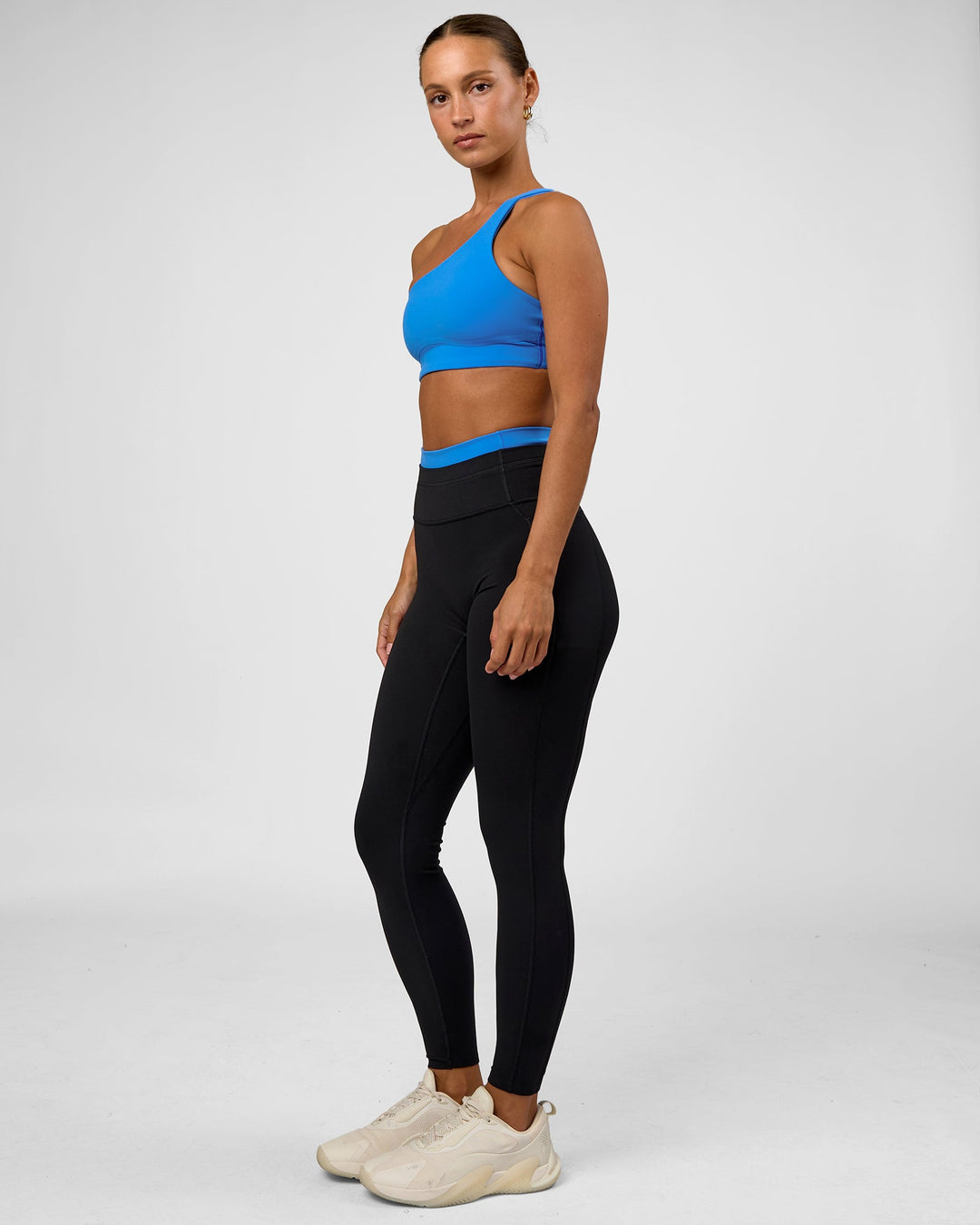 Woman wearing Liberate High-Rise Full Length Legging Pockets - Black-Palace Blue | Model:Brylee | Size:XS