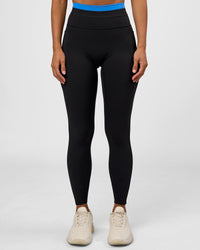 Woman wearing Liberate High-Rise Full Length Legging Pockets - Black-Palace Blue | Model:Brylee | Size:XS