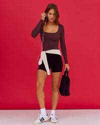 Woman wearing Show It Off Long Sleeve Top in Cherry Lacquer