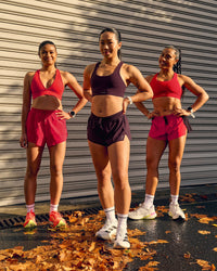 Woman wearing Accelerate 3" High-Rise Running Short - Scarlet
