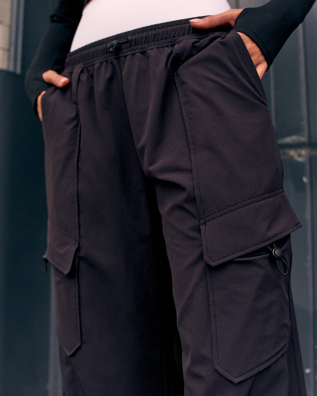 Woman wearing Endeavour Cargo Pant - Black - view 4