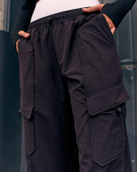 Woman wearing Endeavour Cargo Pant - Black | Thumbnail Index: 3