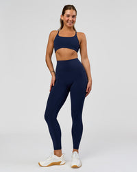 Woman wearing O.G. Fusion Ultra High-Rise Full Length Legging Pockets - Future Navy | Model:Amity| Size:S | Thumbnail Index: 2