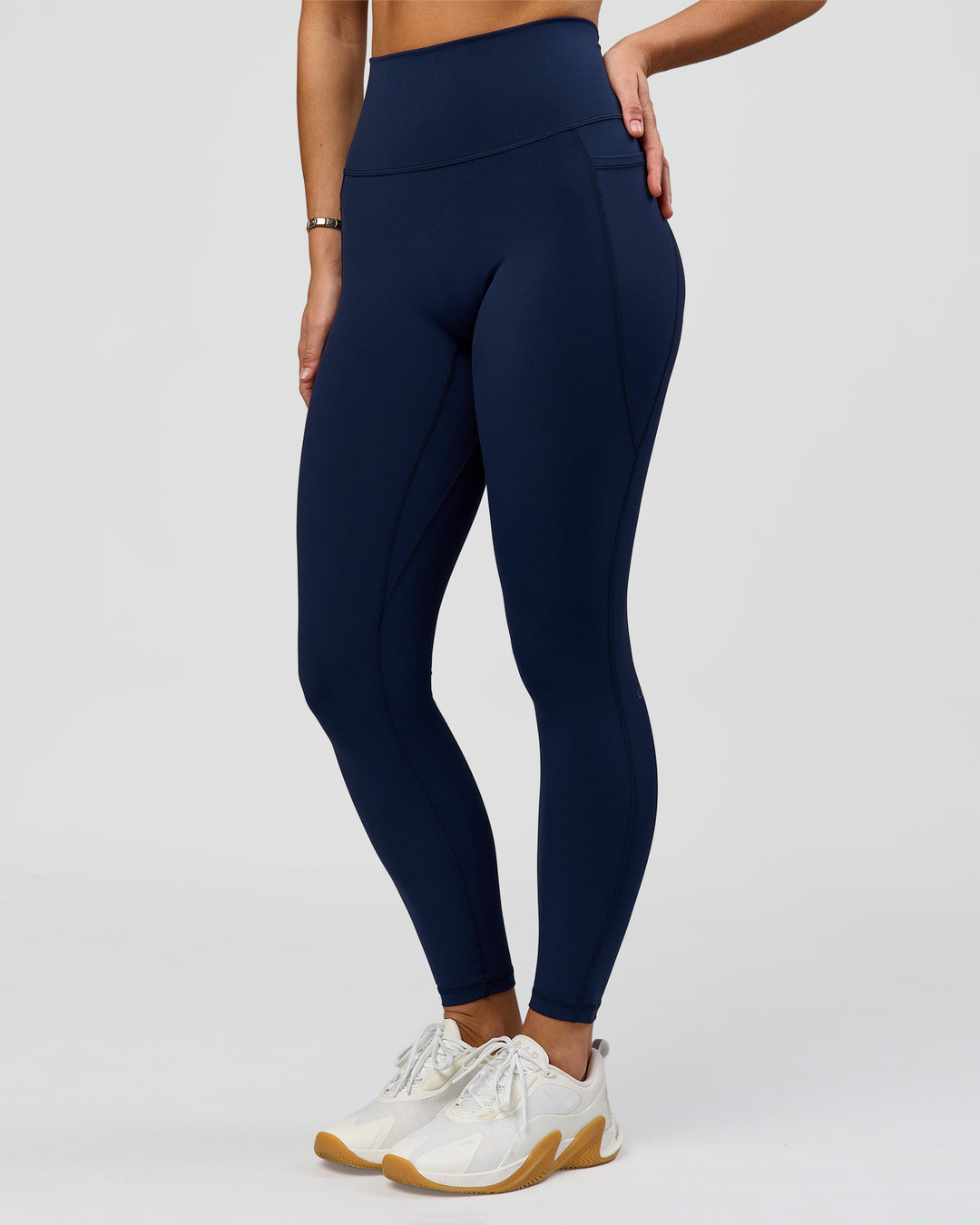 Woman wearing O.G. Fusion Ultra High-Rise Full Length Legging Pockets - Future Navy | Model:Amity| Size:S - view 2
