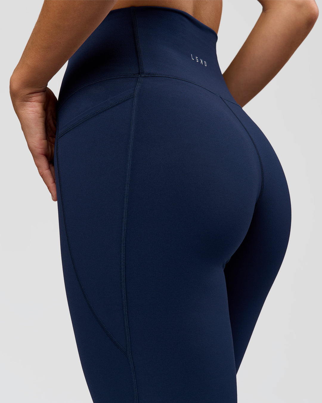 Woman wearing O.G. Fusion Ultra High-Rise Full Length Legging Pockets - Future Navy | Model:Amity| Size:S - view 4