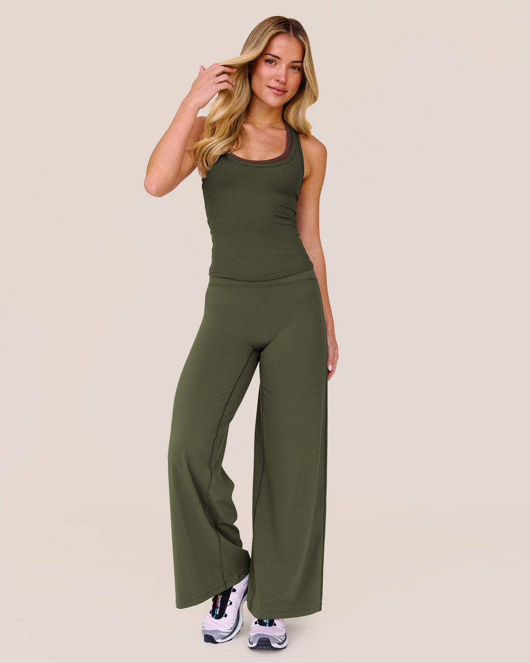 Woman wearing Elixir High-Rise Petite Pant - Pure Olive | Model:Issy | Size:XS - view 14