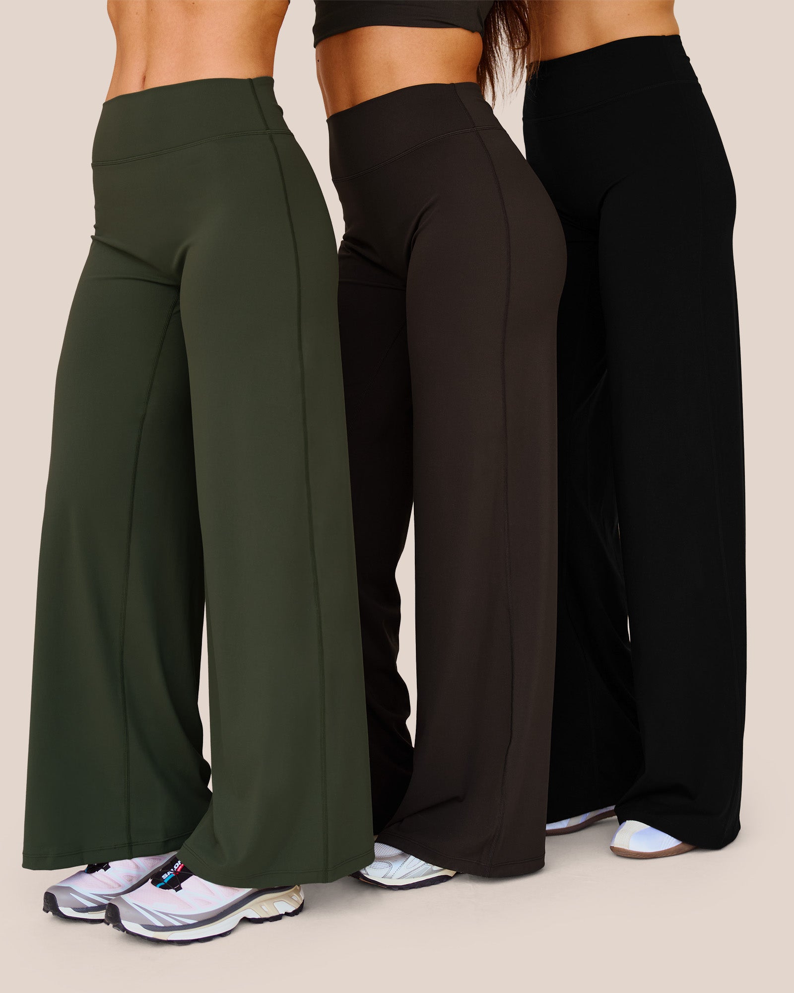Woman wearing Elixir High-Rise Petite Pant - Pure Olive | Model:Issy | Size:XS