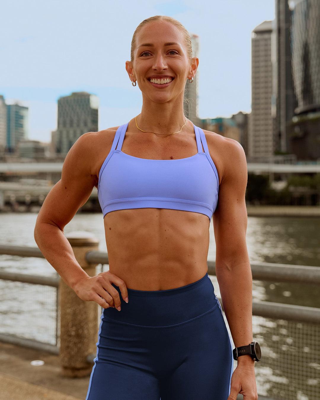 Woman wearing Velocity Sports Bra - Bluebell | Model:Bec| Size:S - view 1