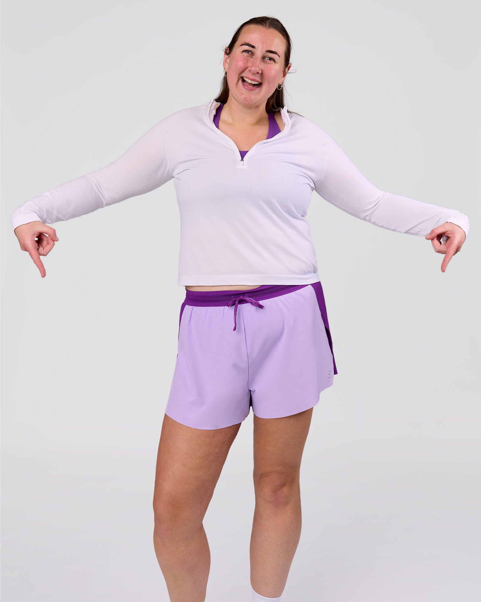 Woman wearing Accelerate 3" High-Rise Running Short - Chloe Purple | Model:Chloe | Size:3XL