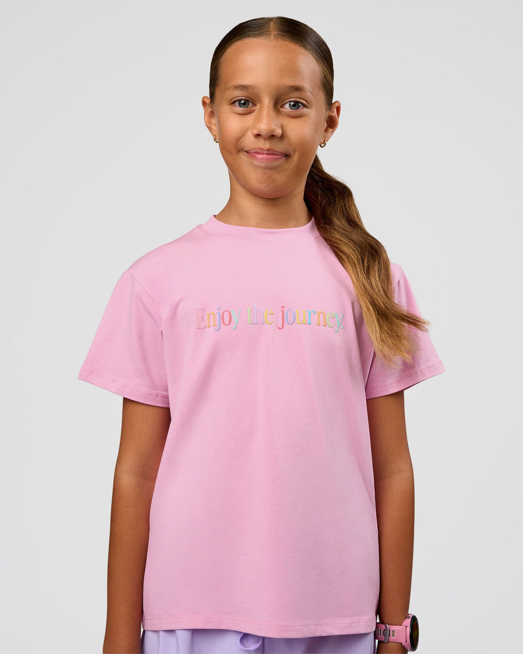 Kid wearing Kids Enjoy the Journey FLXCotton Tee - Bubblegum | Model:Jayla | Size:10