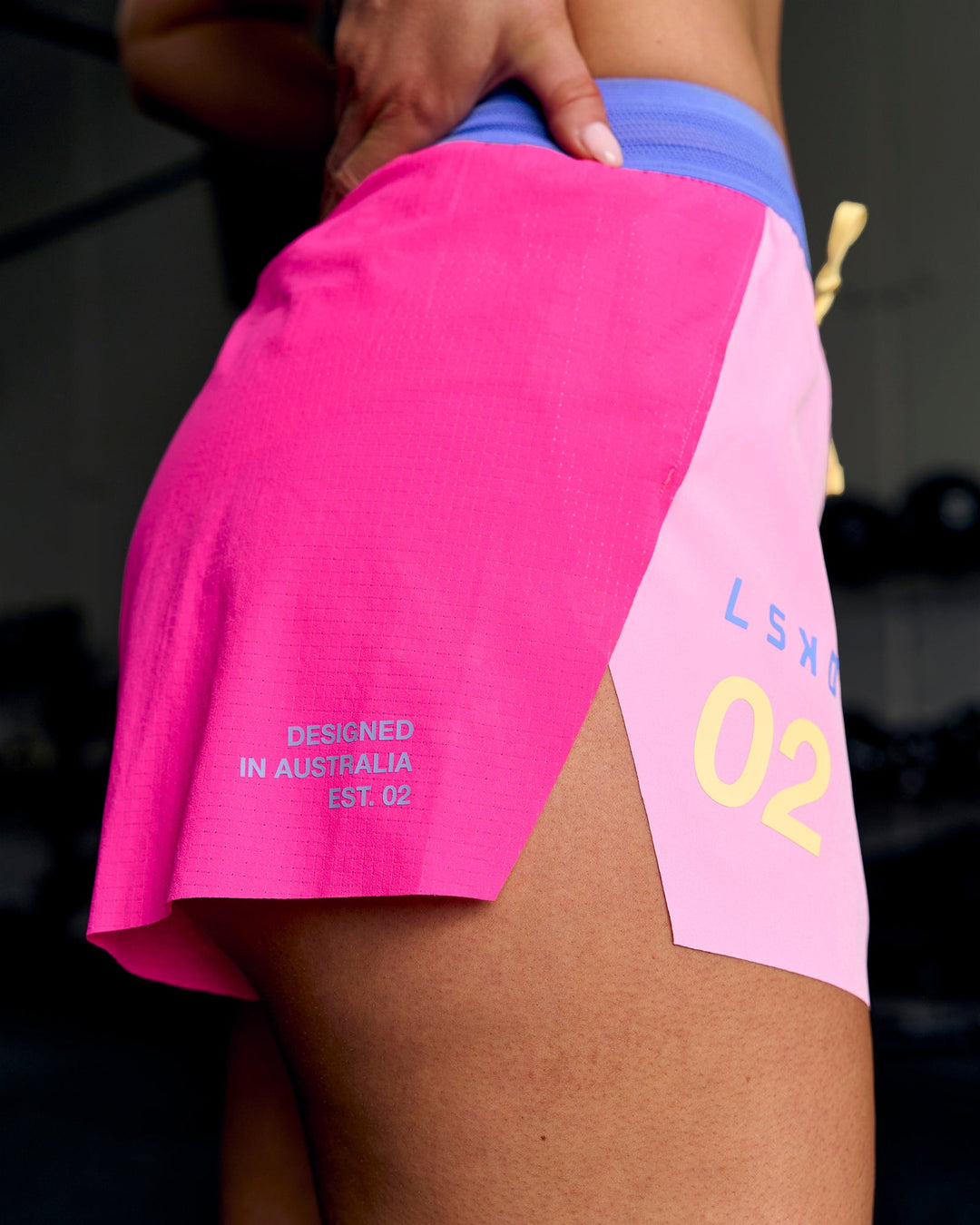 Woman wearing Accelerate 3" High-Rise Running Short - Ultra Pink-Tech Department - view 13