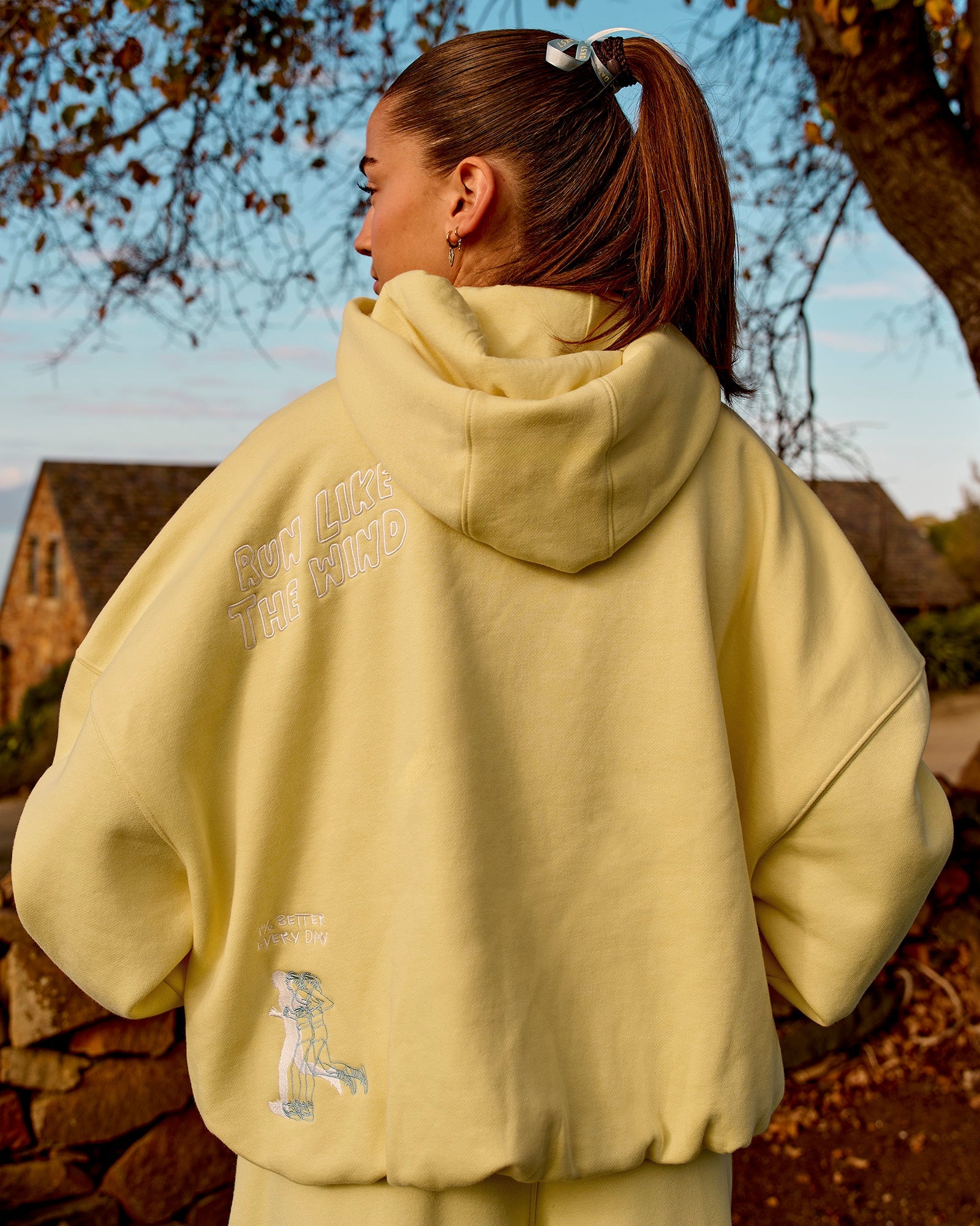Woman wearing Zola Oversized Hoodie - Lemon | Model:Grace | Size:M