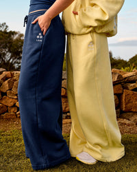 Woman wearing Zola Wide Leg Lounge Pant - Future Navy and Lemon | Model:Grace | Size:S | Model:Carole | Size:M