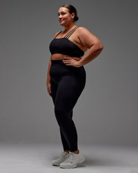 Woman wearing Fusion Ultra High-Rise Full Length Legging Pockets - Black | Model:Jordie | Size:2XL