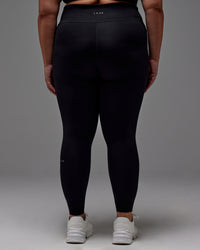 Woman wearing Fusion Ultra High-Rise Full Length Legging Pockets - Black | Model:Jordie | Size:2XL