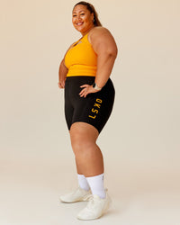 Woman wearing Rep Ultra High-Rise 6" Short Pockets - Black-Zinnia | Model:Lilz | Size:3XL