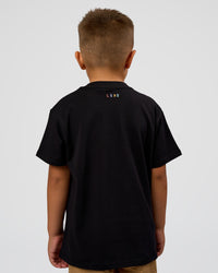 Kid wearing Kid wearing Kids Enjoy the Journey FLXCotton Tee - Bubblegum | Model:Jax | Size:6