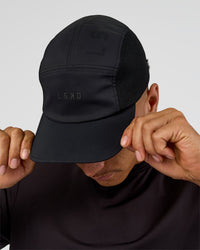 Man wearing Accelerate Cap - Black