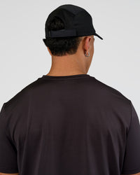 Man wearing Accelerate Cap - Black