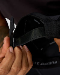 Man wearing Accelerate Cap - Black