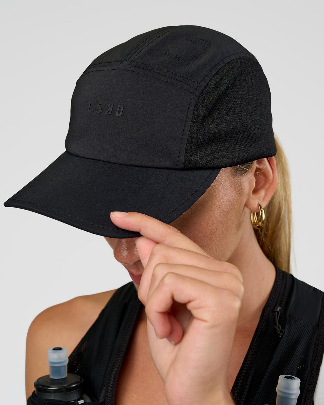 Woman wearing Accelerate Cap - Black