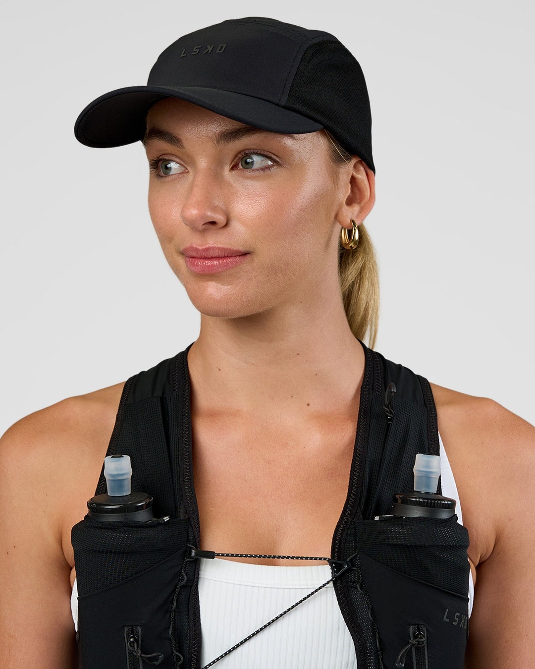 Woman wearing Accelerate Cap - Black