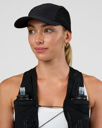 Woman wearing Accelerate Cap - Black