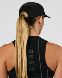 Woman wearing Accelerate Cap - Black