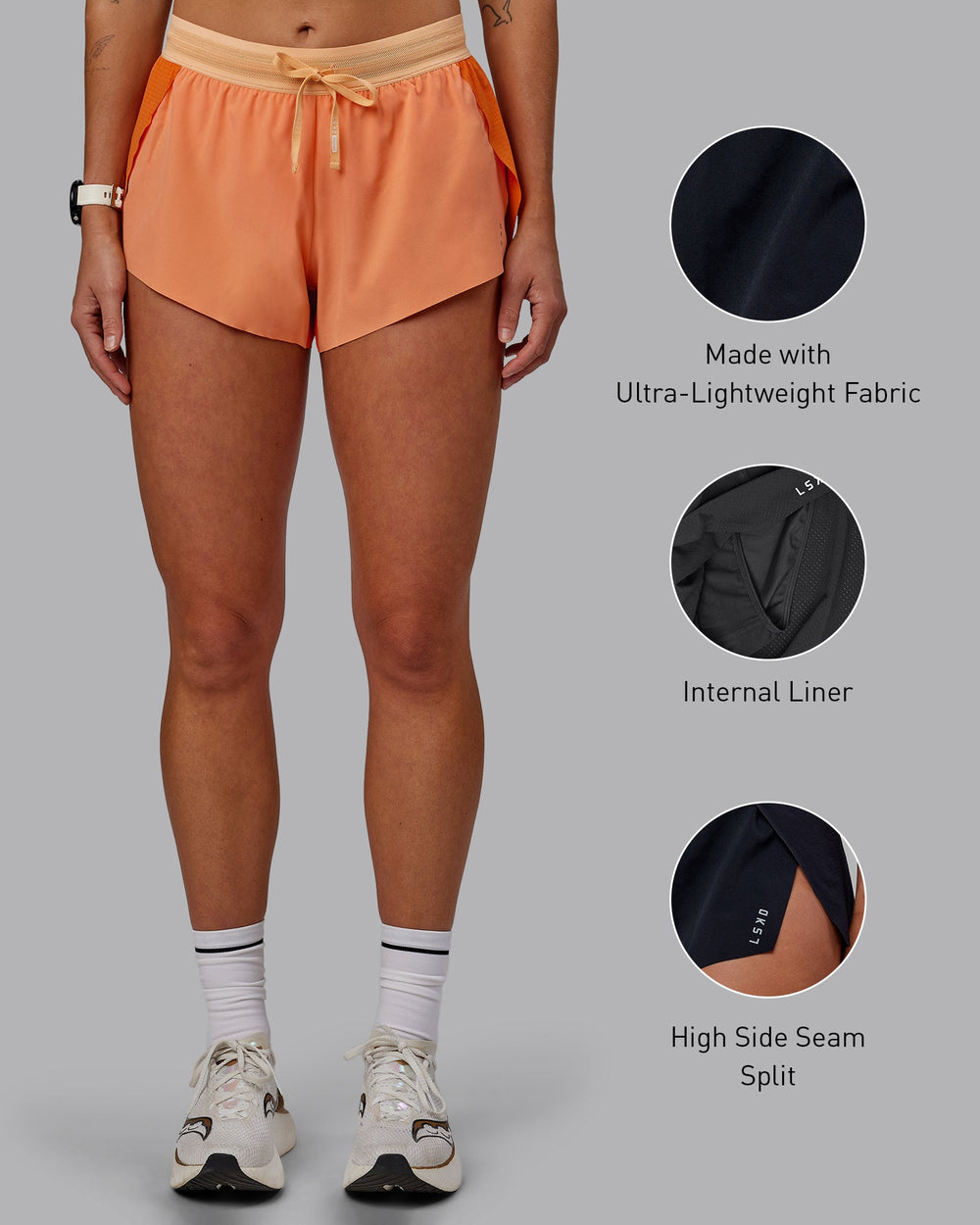 Woman wearing Accelerate 3" Run Shorts - Cantaloupe Colourblock