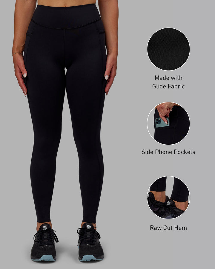 Woman wearing Elite Full Length Leggings - Black
