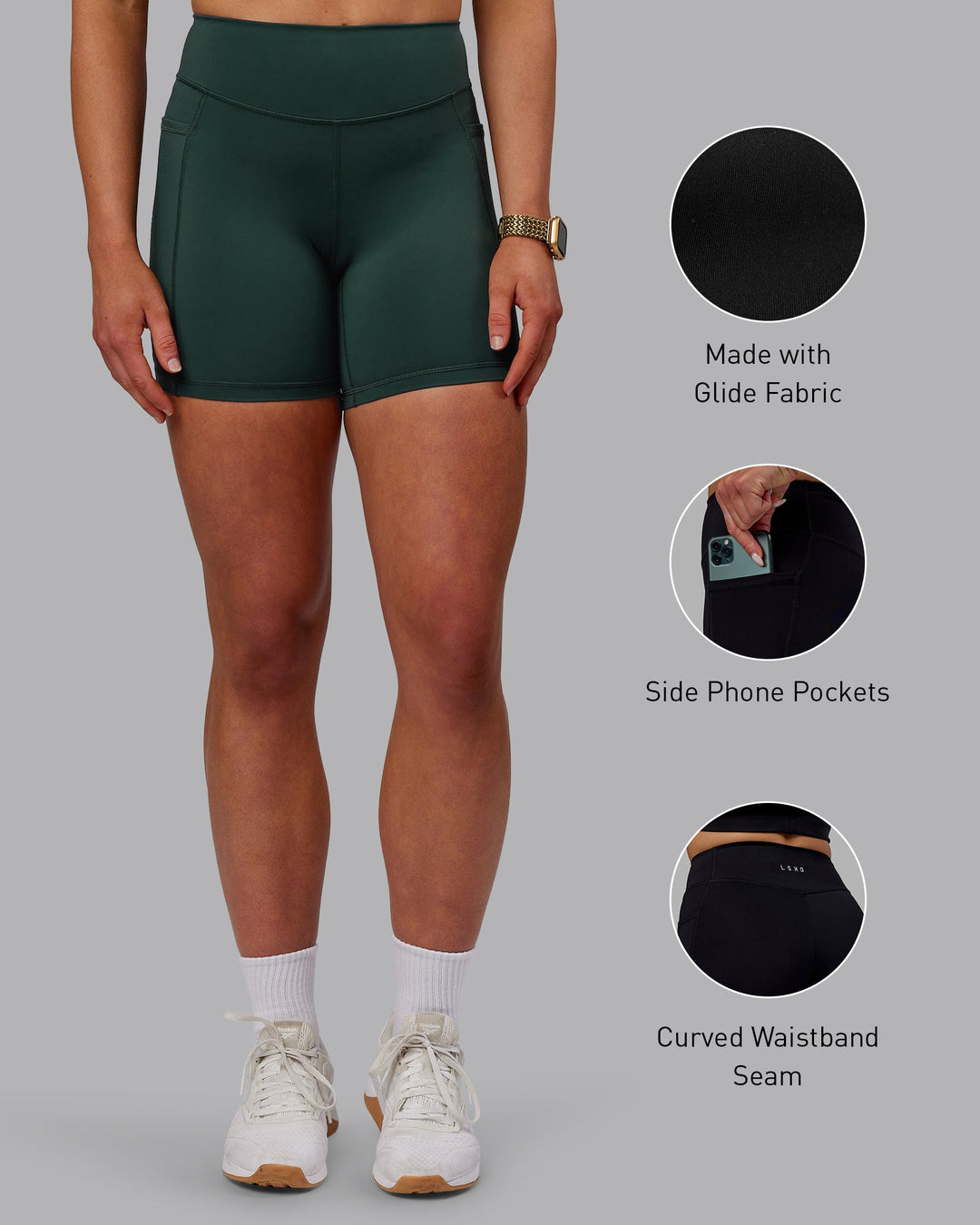 Woman wearing Elite Mid-Length Shorts - Vital Green