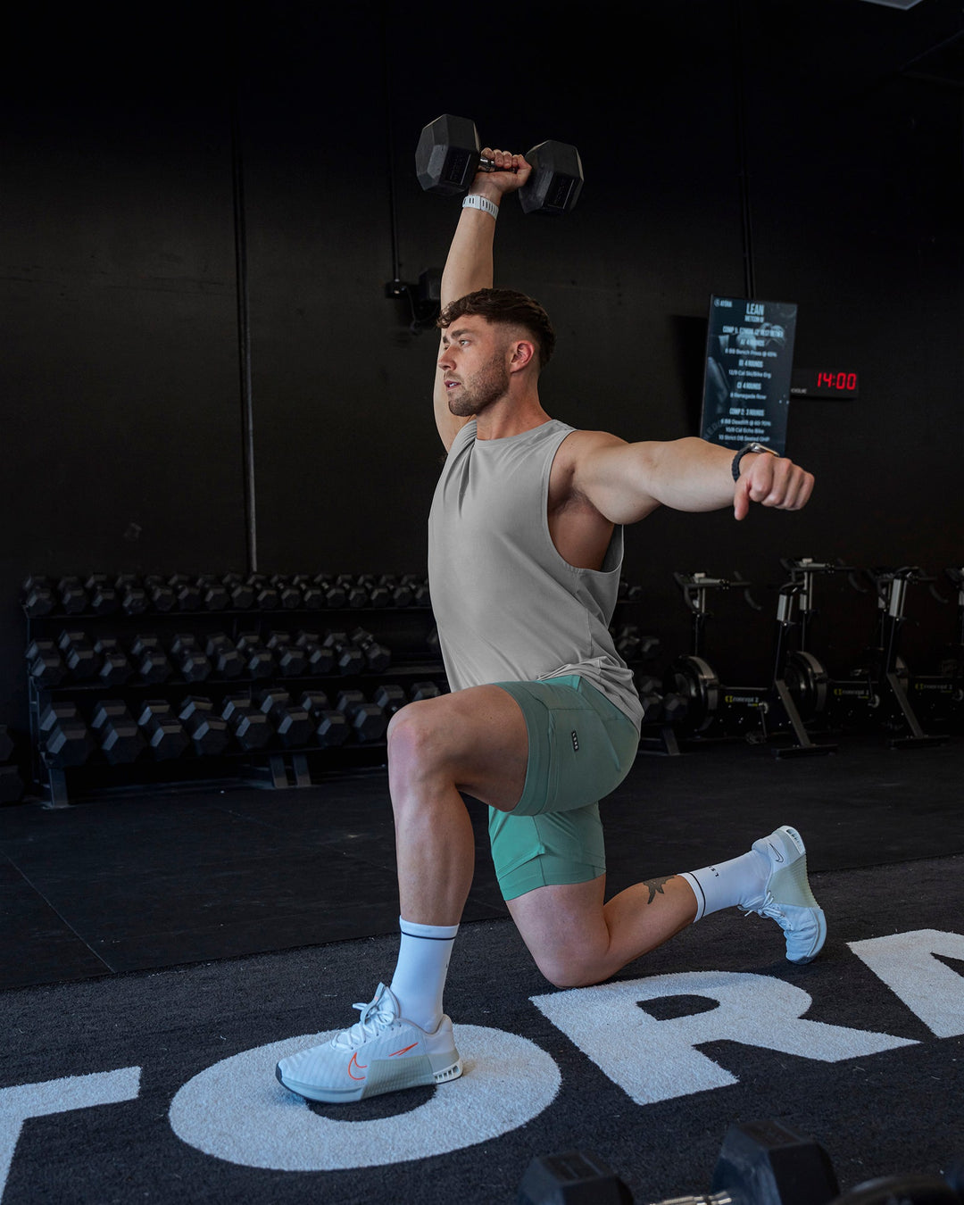 Man wearing Challenger 6&quot; Lined Performance Shorts - Sagebrush