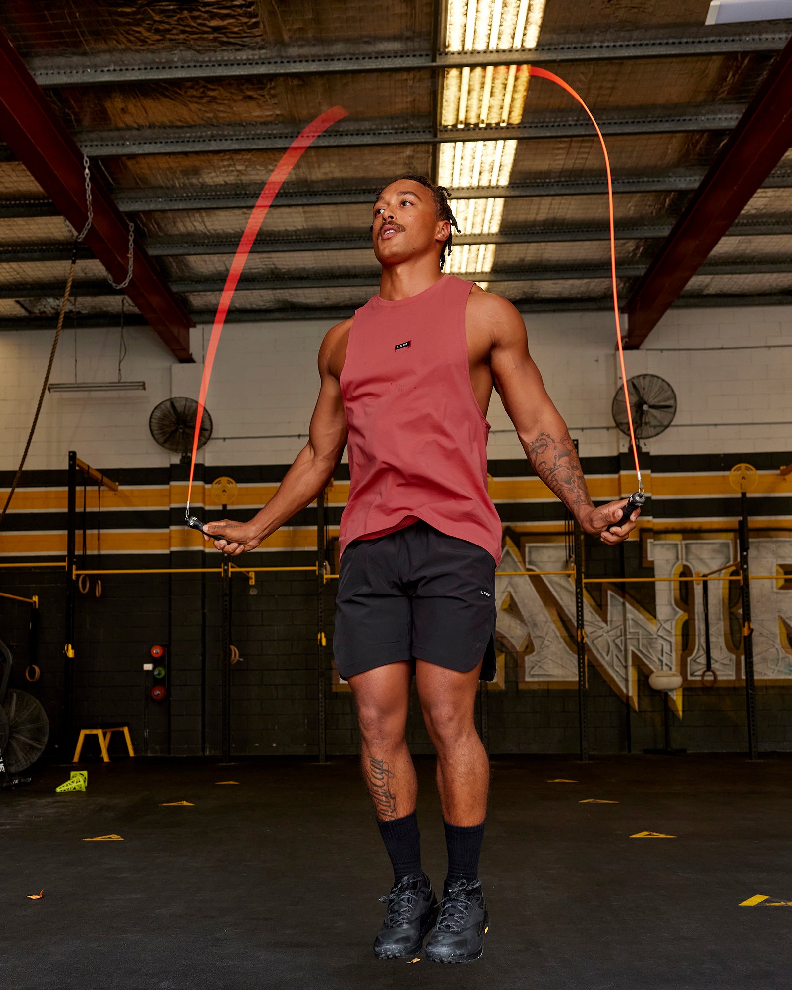 Man wearing Competition 8" Performance Short - Black