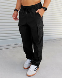 Man wearing Energy Stretch Relaxed Fit Cargo Pants - Black