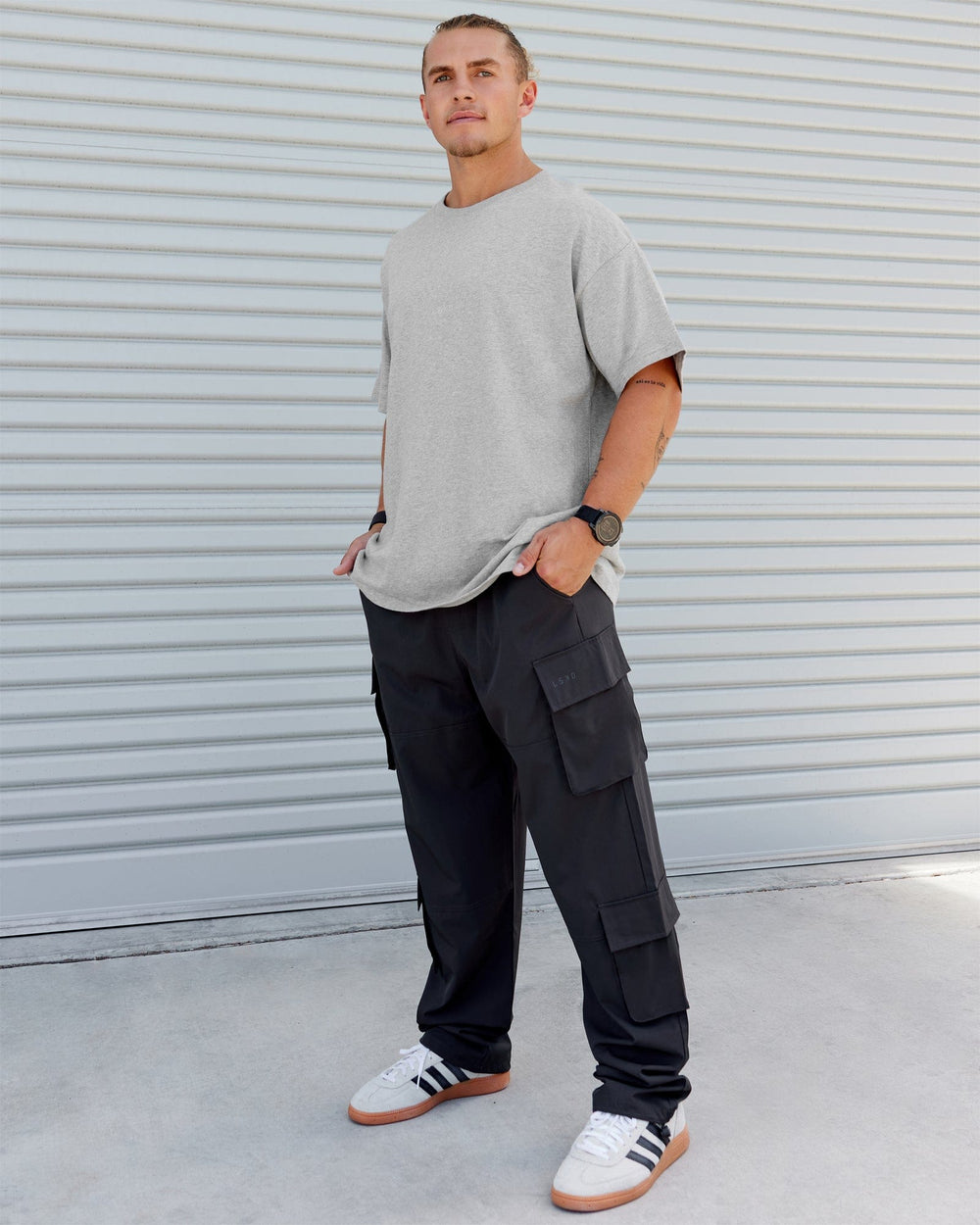 Man wearing Energy Stretch Relaxed Fit Cargo Pants - Pirate Black