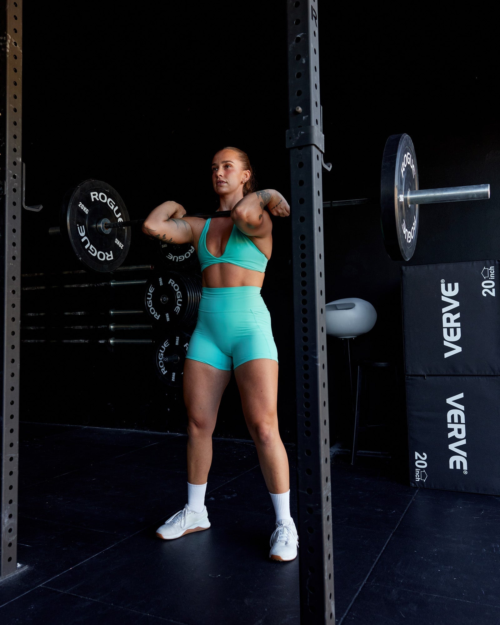 Woman wearing Fusion Ultra High-Rise 4" Short Pockets - Aquatic Awe | Model:Robyn | Size:S