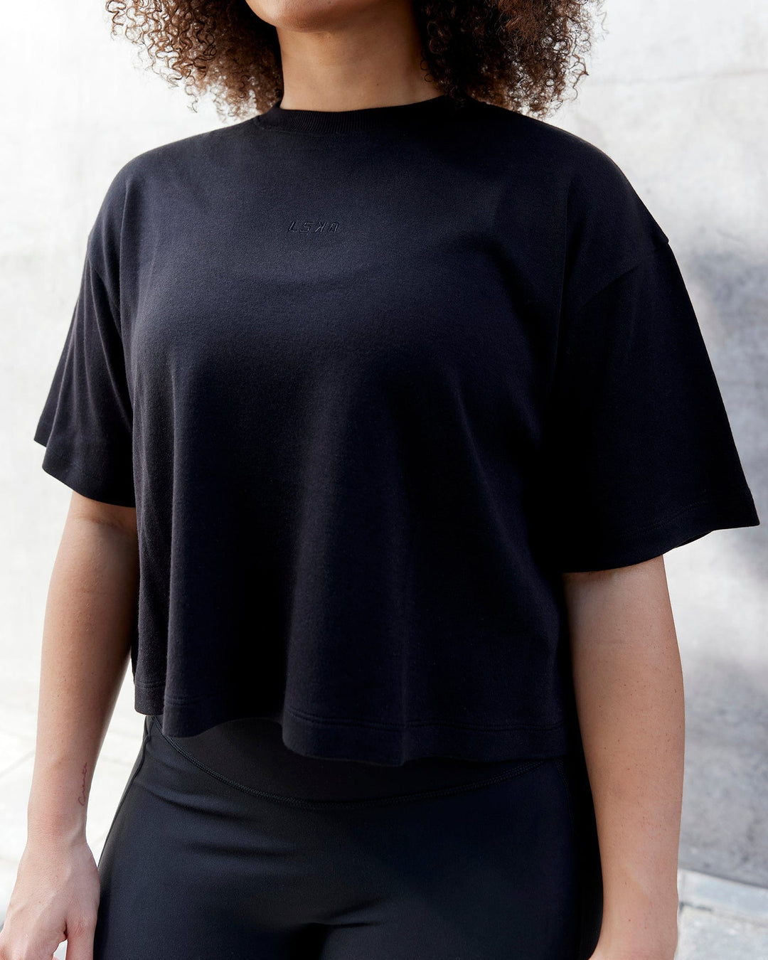 Woman wearing Go-To Modal Oversized Cropped Tee - Black-Black