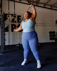 Woman wearing Lift Performance Tank - Glacial Blue