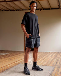 Man wearing MVP Heavyweight Tee Oversize - Black