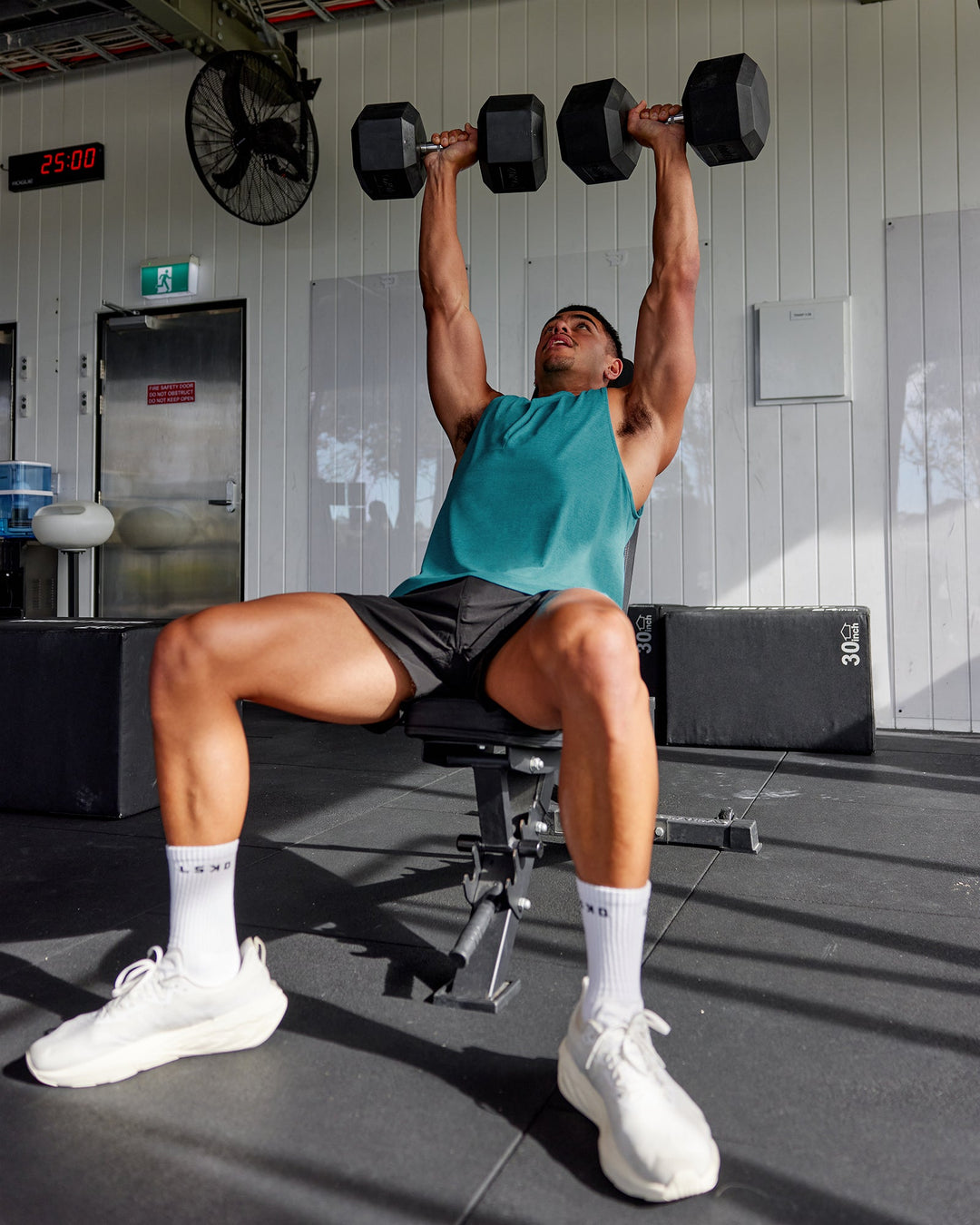 Man wearing AeroFLX+ Seamless Muscle Tank - Blue Bird Marl