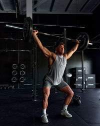 Wan wearing AeroFLX+ Seamless Muscle Tank - Light Grey Marl