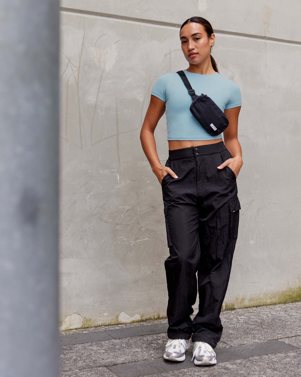 Woman wearing Staple Cropped Tee - Glacial Blue