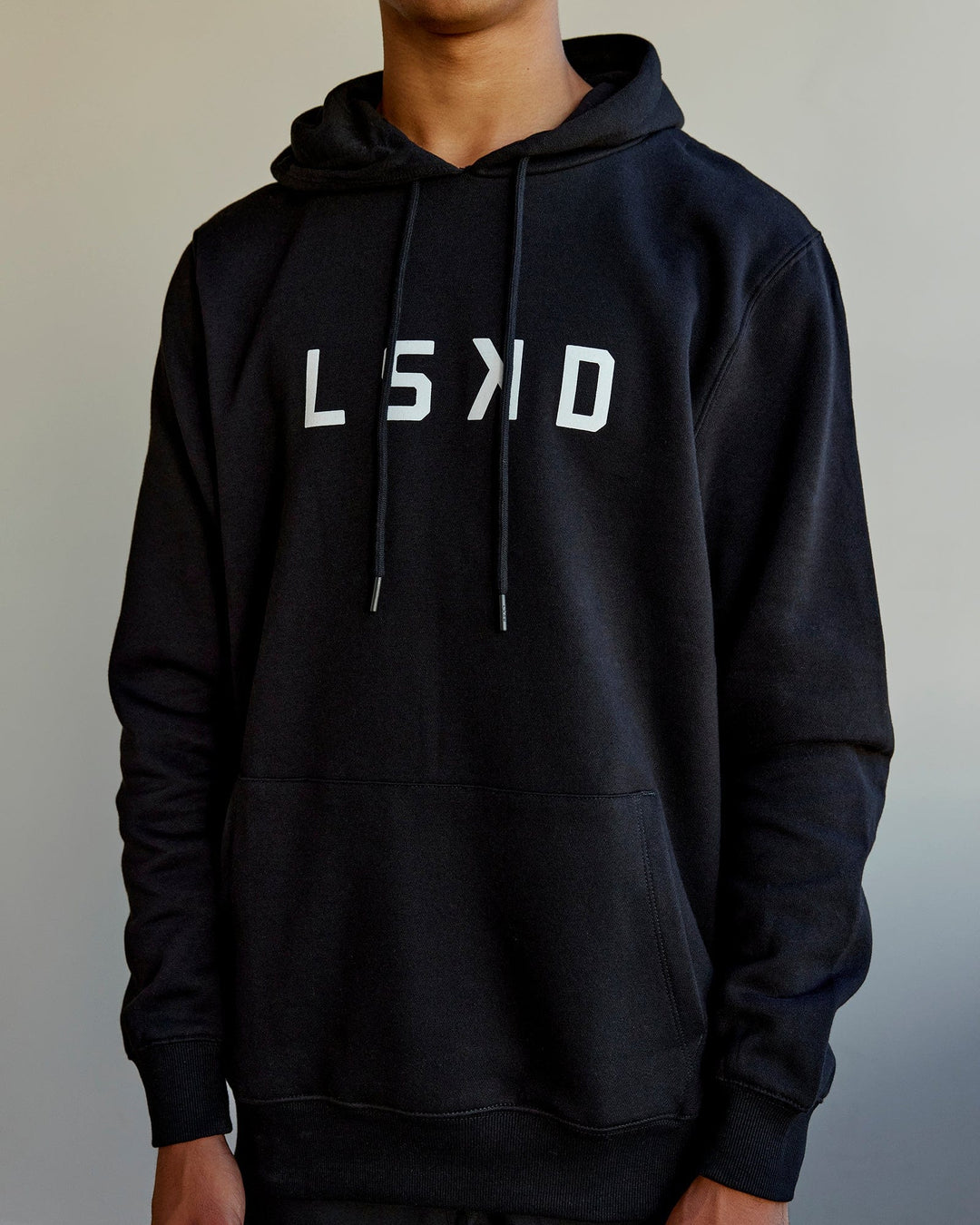 Man wearing Unisex Structure Hoodie - Black-White