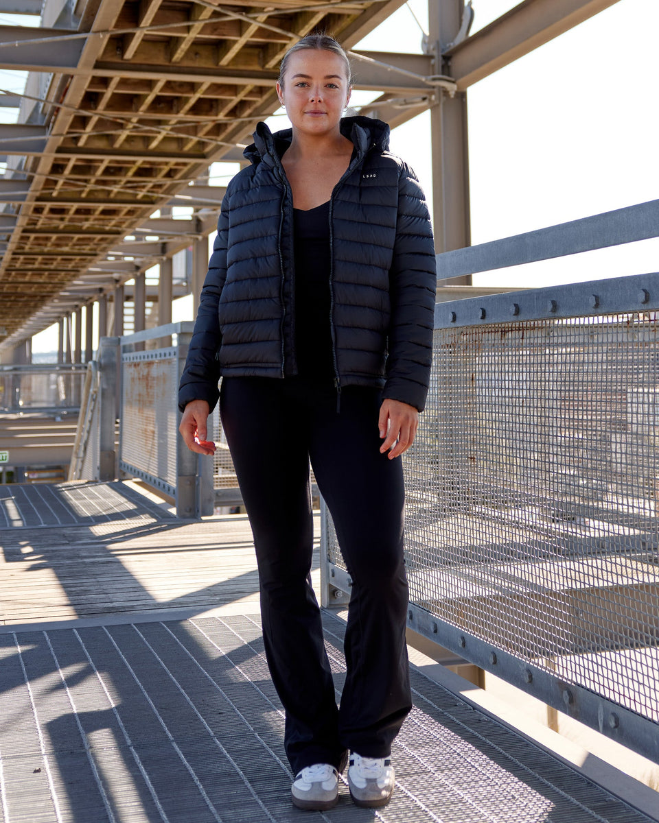 Woman wearing All Day Puffer Jacket - Black