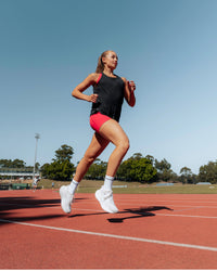 Woman wearing Pace Running Tank - Black