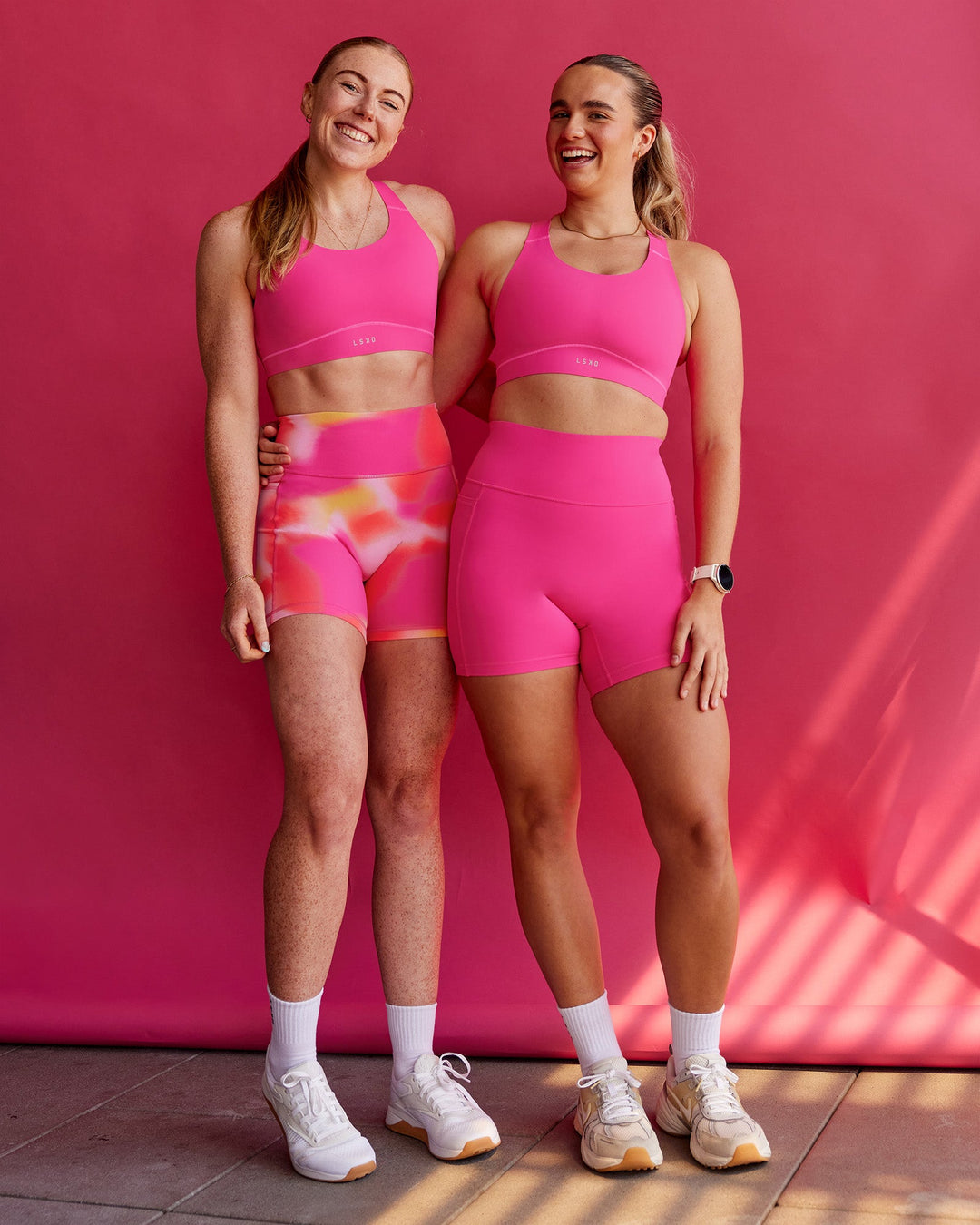 Woman wearing Fusion Sports Bra 2.0 - Ultra Pink