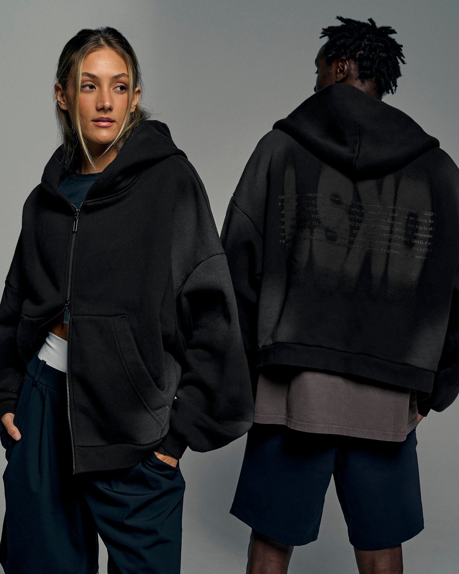 Man wearing Memory in Motion Ultra Heavyweight Zip Thru Hoodie - Black Washed | Model:Both | Size:Duo