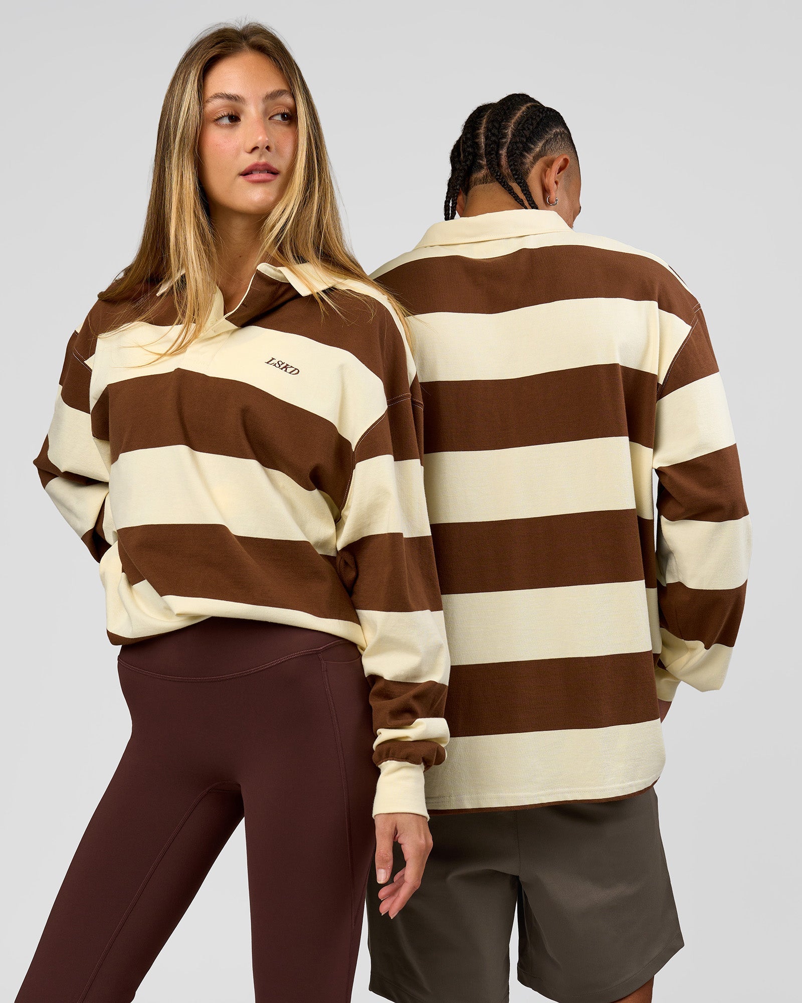 Duo wearing Clubhouse Unisex Polo - Off White-Brown | Model:Both | Size:Duo