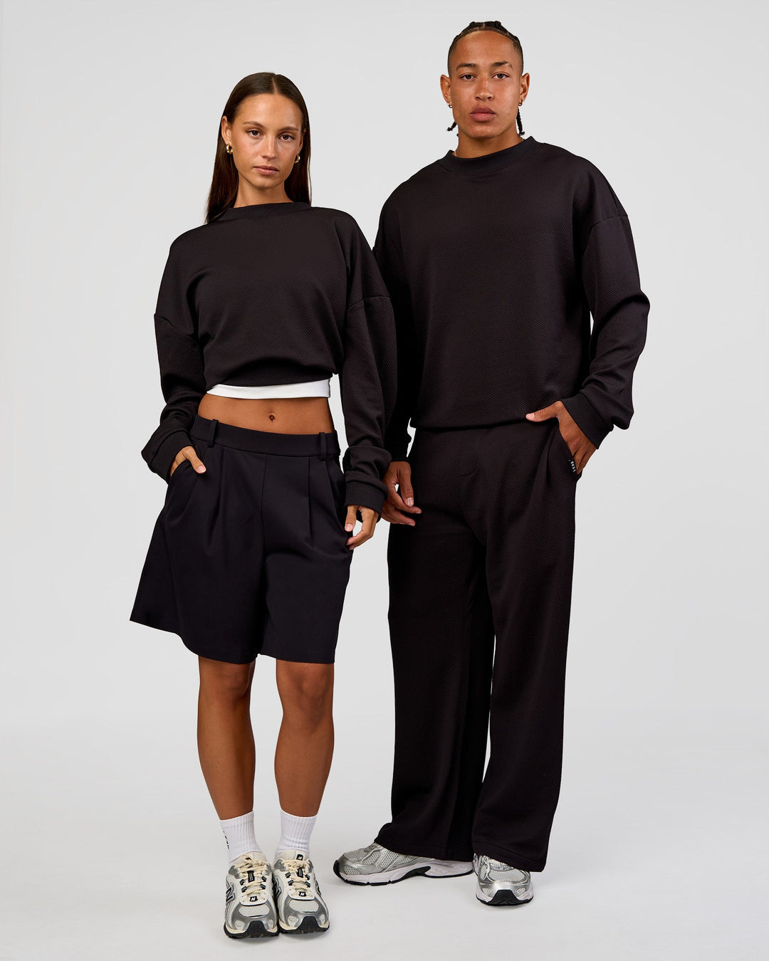 Duo wearing Everyday Elevation Waffle Oversized Sweater - Black | Model:Brylee | Size:XS | Model:Malebo | Size:M